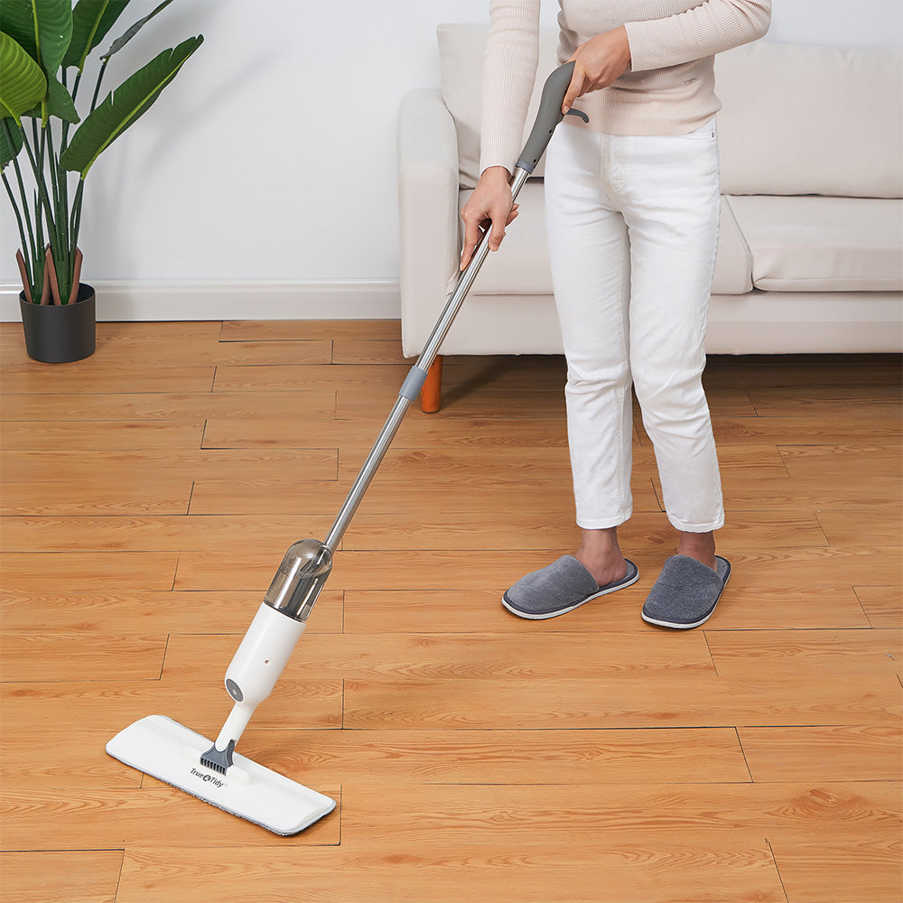 SPRAY250 + White + Cleaning-4 + spray mop being used on laminate floors