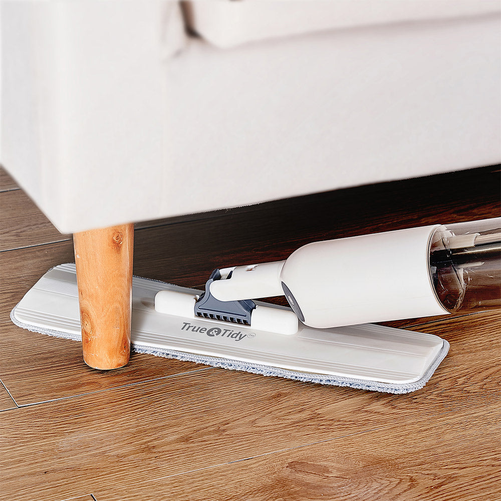 SPRAY250  White  Cleaning-6  spray mop being used to clean under furniture