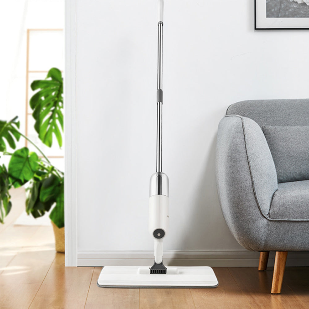 SPRAY250 + White + Cleaning-7 + white spry mop leaning against living room wall 