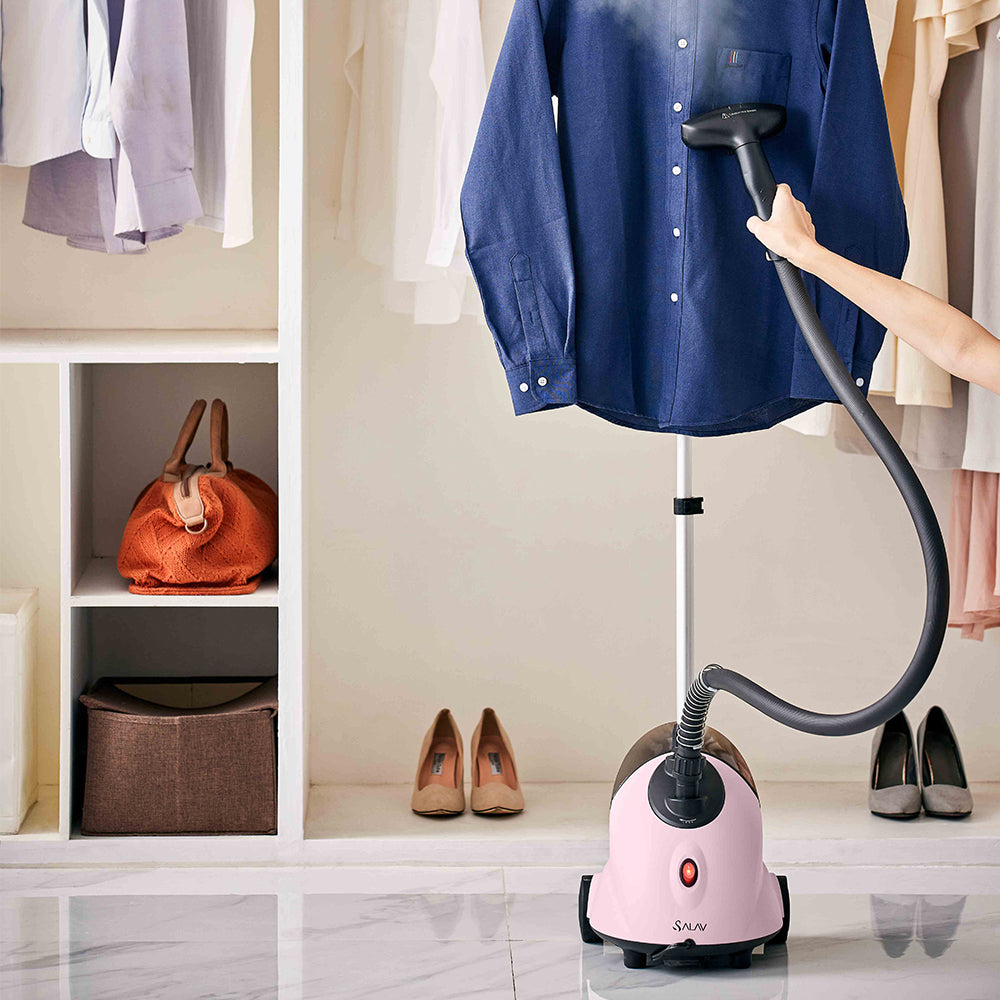 GS18 + Pink + Garment Steamers-5 + steaming blue shirt in a closet