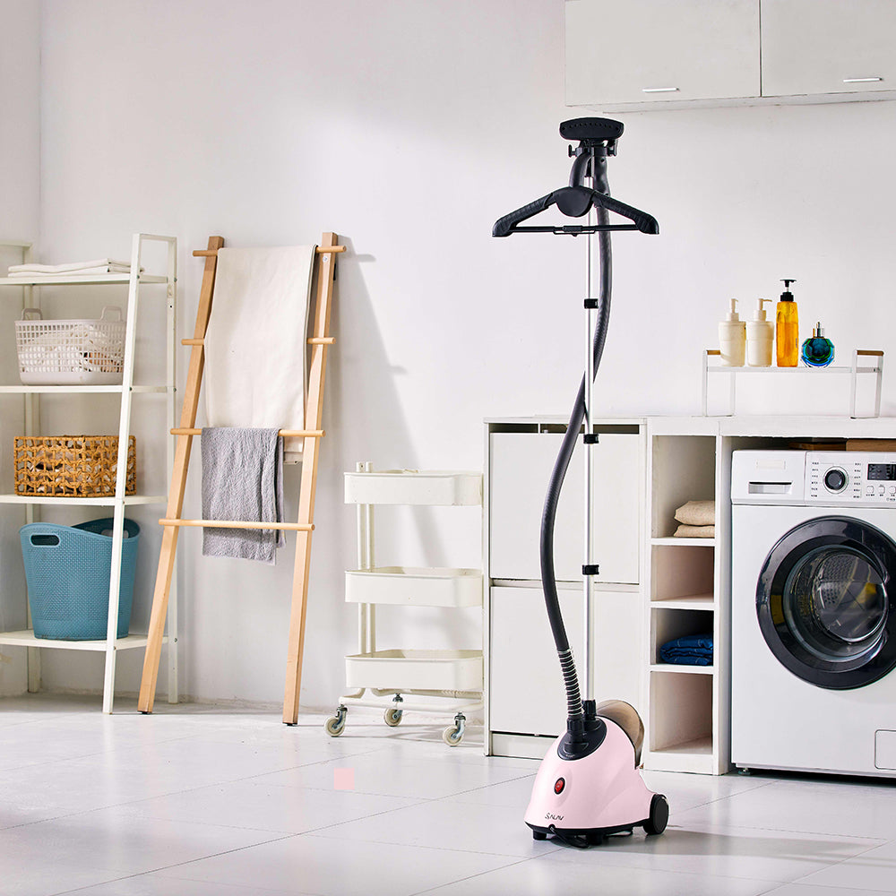 GS18 + Pink + Garment Steamers + GS18 Pink upright steamer in a laundry room