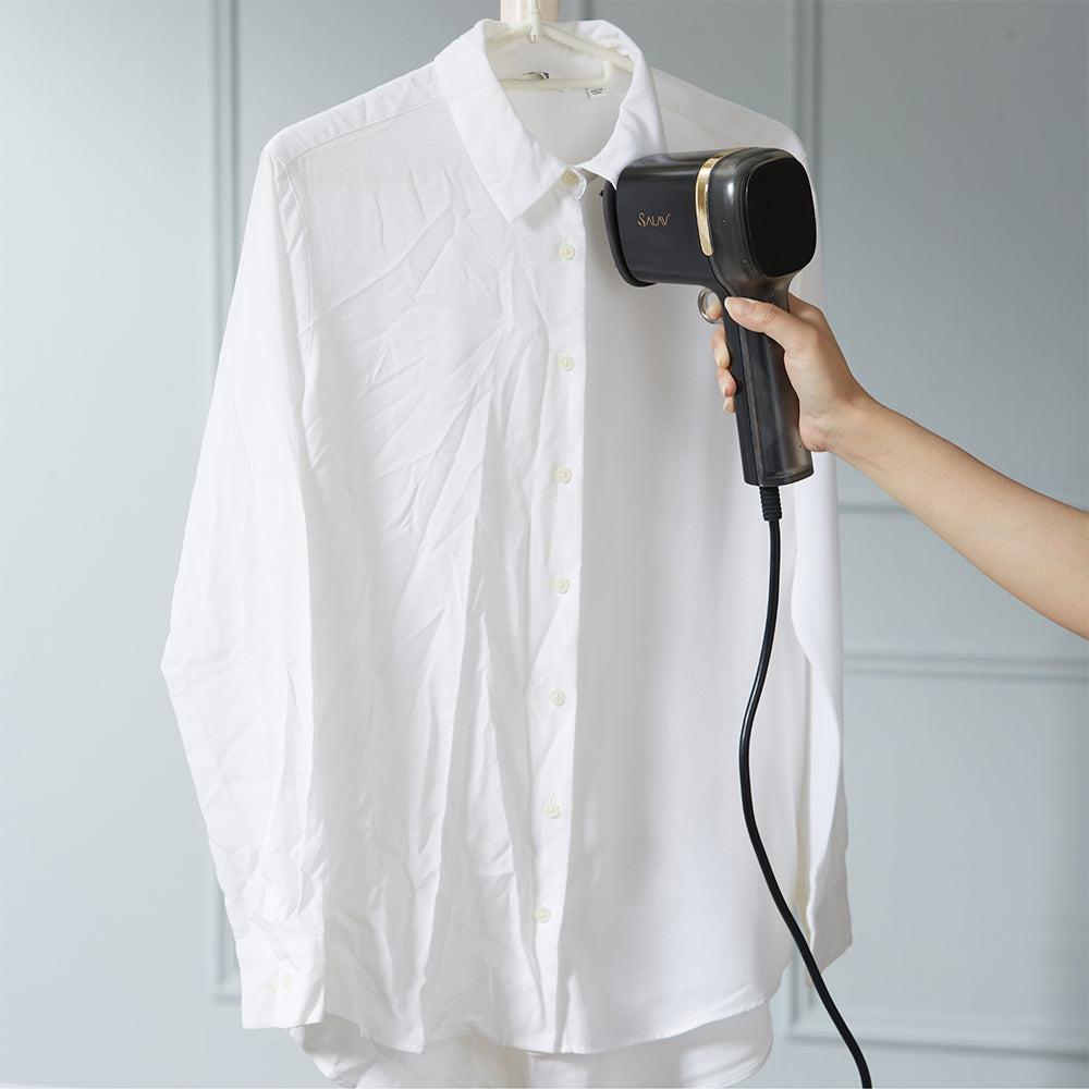 HS15 + Black/Gold + Hand Held Steamers-7 + pressing the collar on a white shirt with the creaser attachment