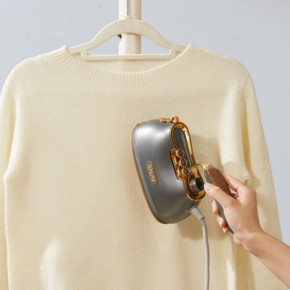 IS900 + Titanium + Garment Steamers-6 + steaming light yellow sweater