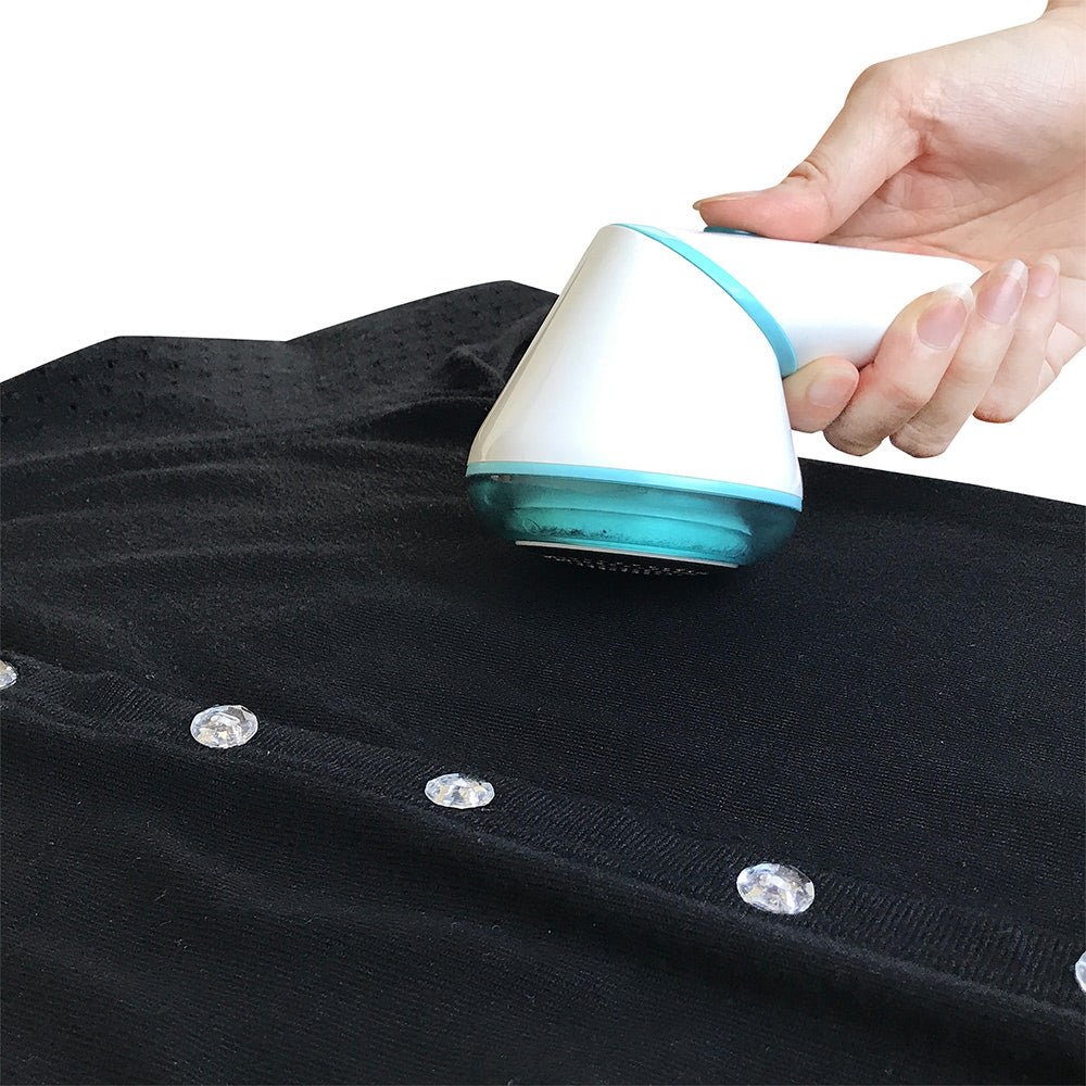 LR01 + Teal + Fabric Shavers-5 + removing lint from black sweater