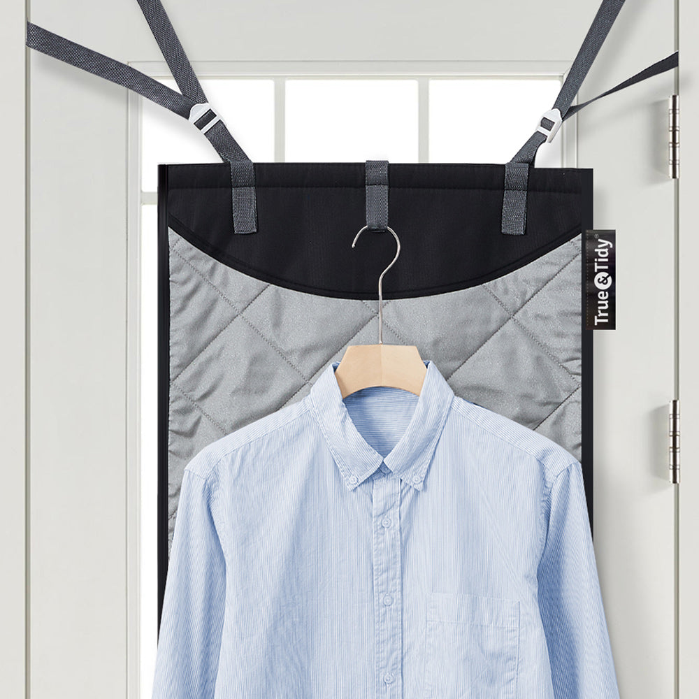 MAT200  Black  Laundry Care-1  MAT200 hanging on a door with single hanger holding blue shirt