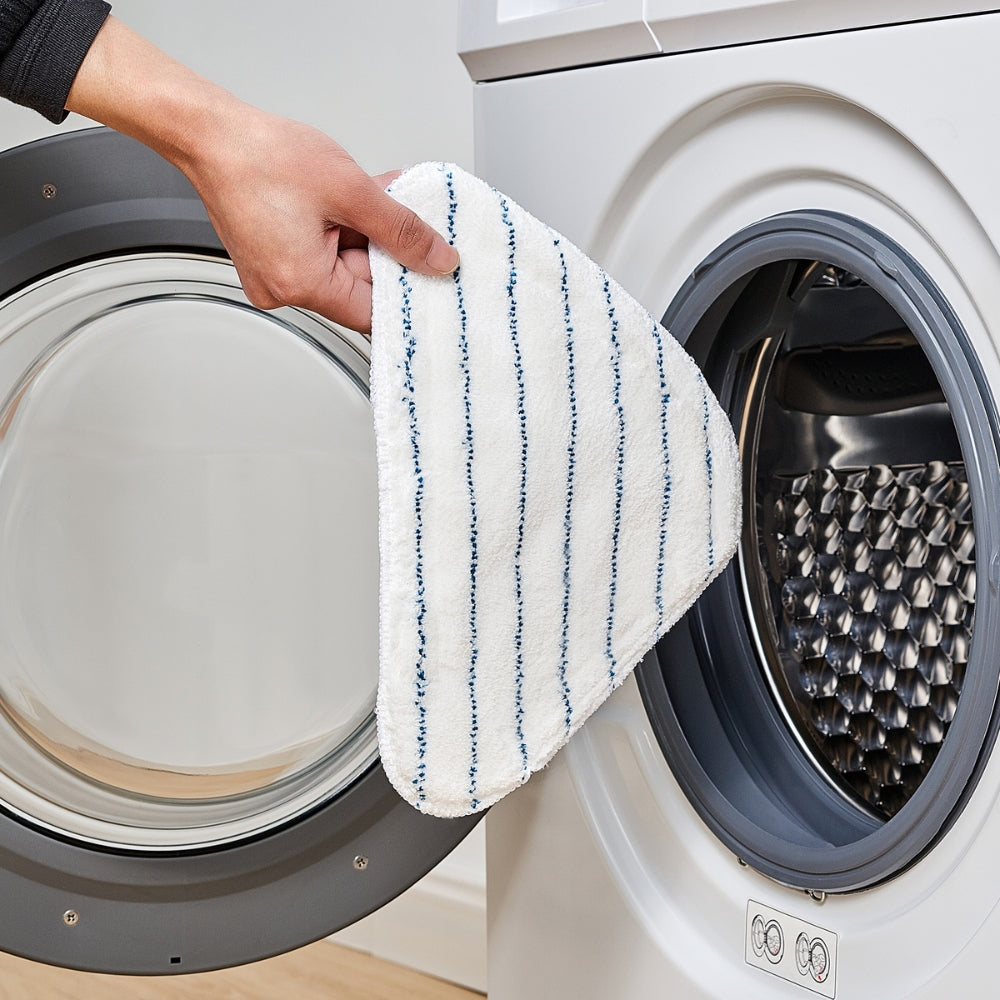 person placing MP300 microfiber mop pad in washing machine