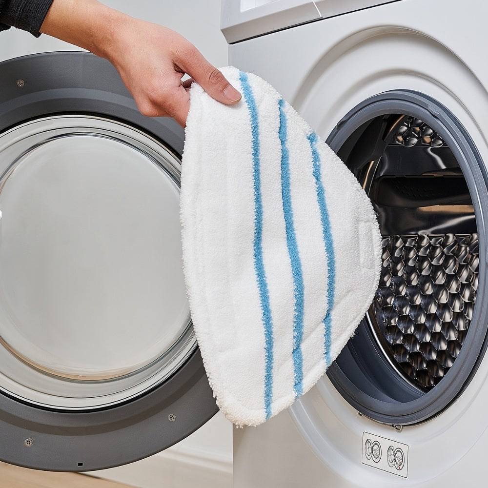 person placing microfiber mop pad MP500 in washing machine