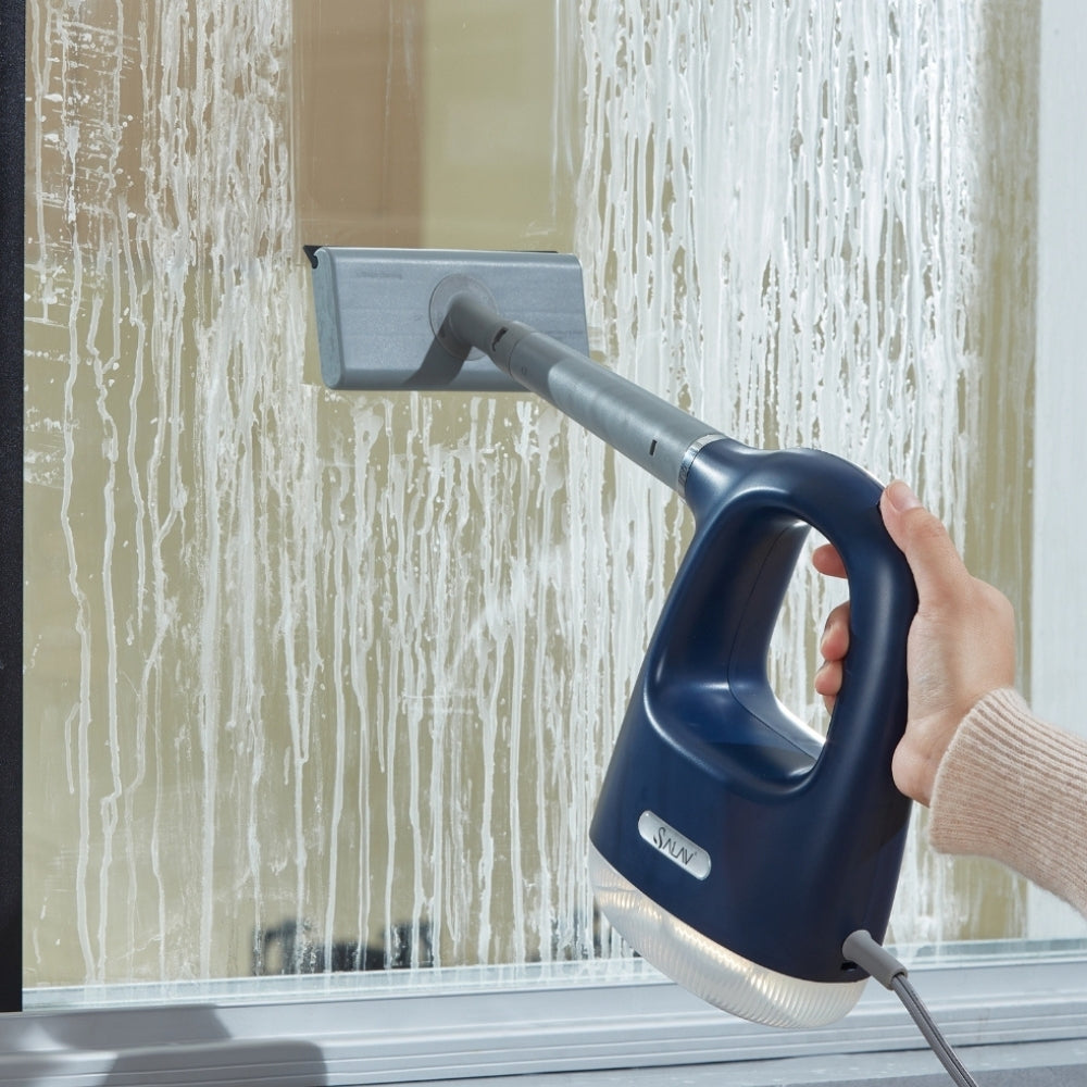 squeegee head attached to CS100 cleaning dirty window