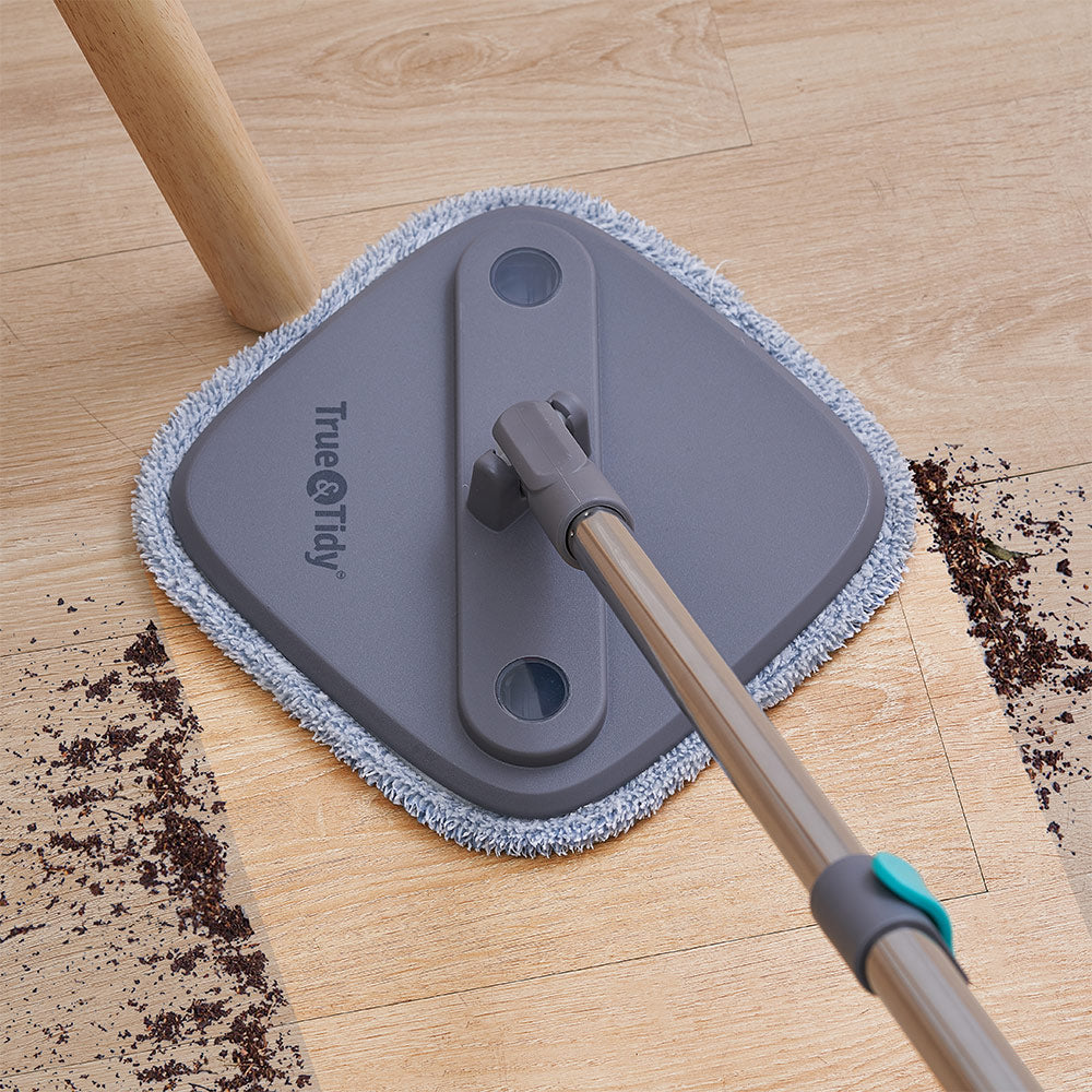 SPIN800  Gray  Cleaning-4  Spin Mop picking up dirt on wood floors