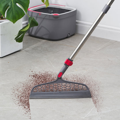 silicone sweeper cleaning coffee on tile