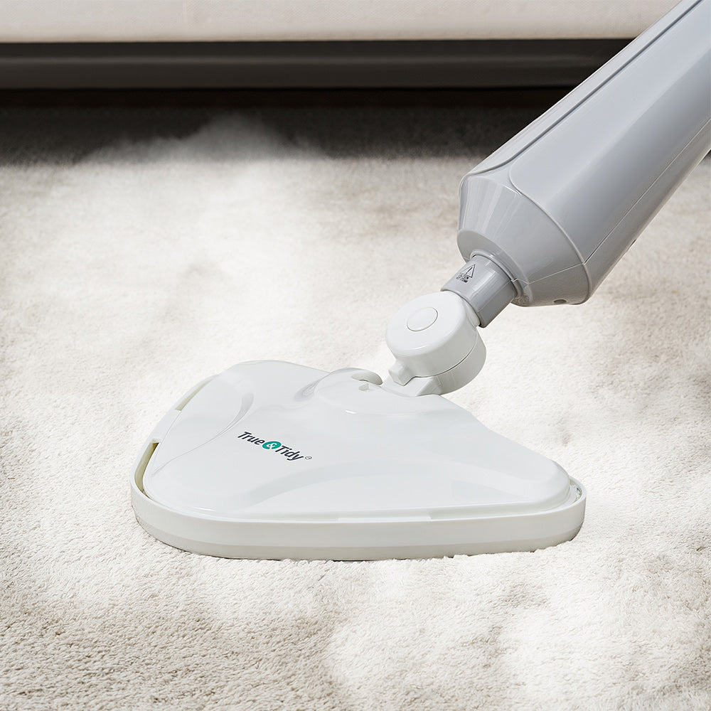 STM300 + Gray + Cleaning-7 + close up with carpet glider steam cleaning carpet
