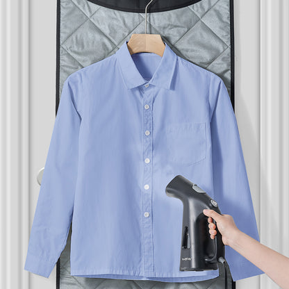 TS38 + Black + Laundry Care-5 + steaming blue cotton shirt with MAT200 against door