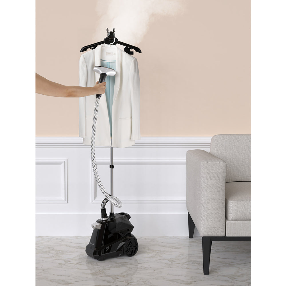 X3 + Navy + Garment Steamers-6 + steaming white jacket and blouse in living room