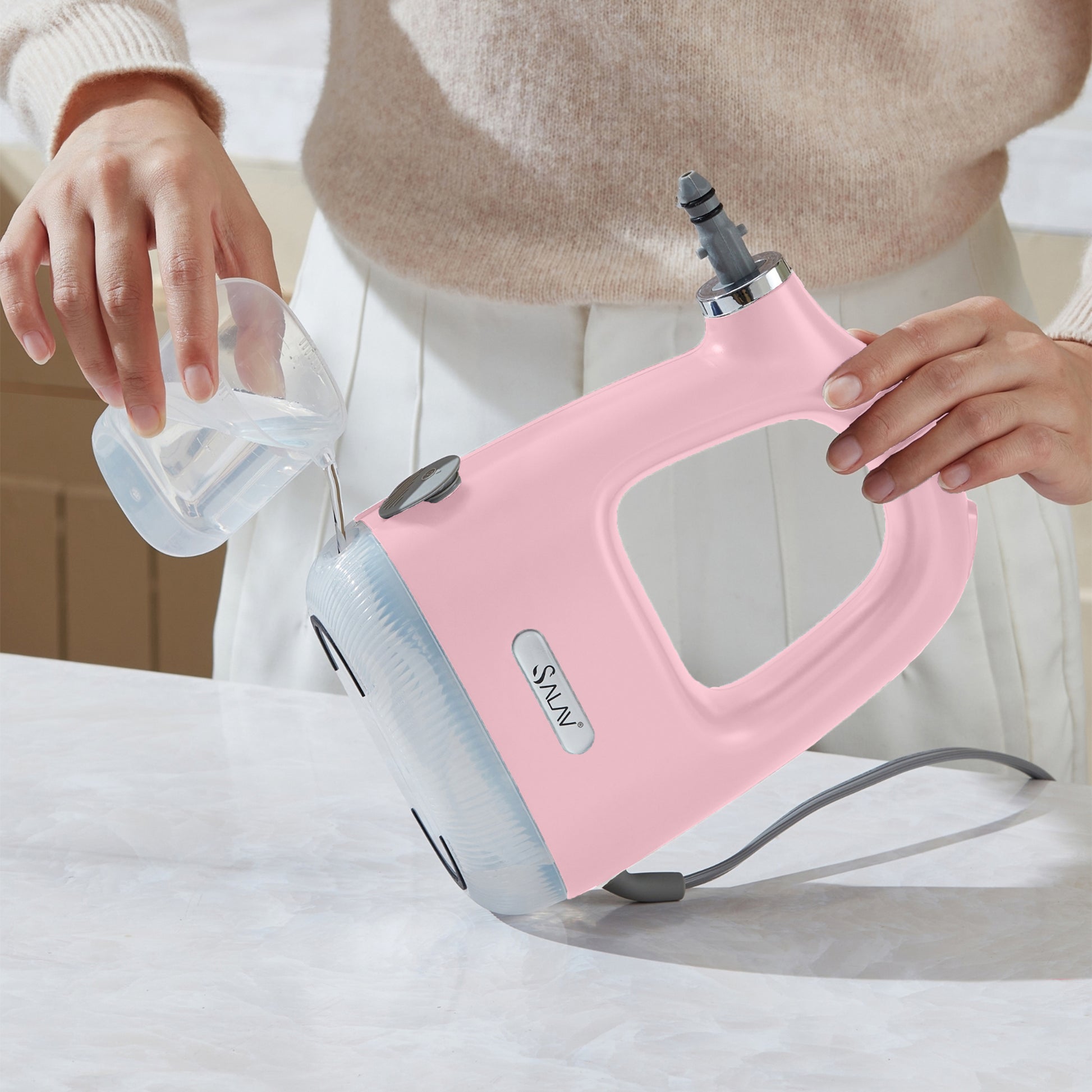 CS100PinkWoman filing water tank