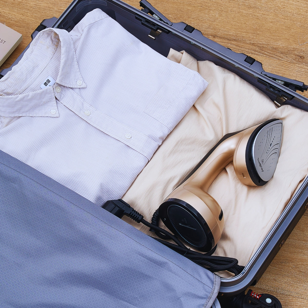 IS1600+Gold+TravelReady+Steamer fits in Suitcase