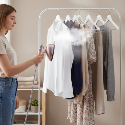 SS1500+RoseGold+Woman using a steam iron on clothes hanging on a rack.