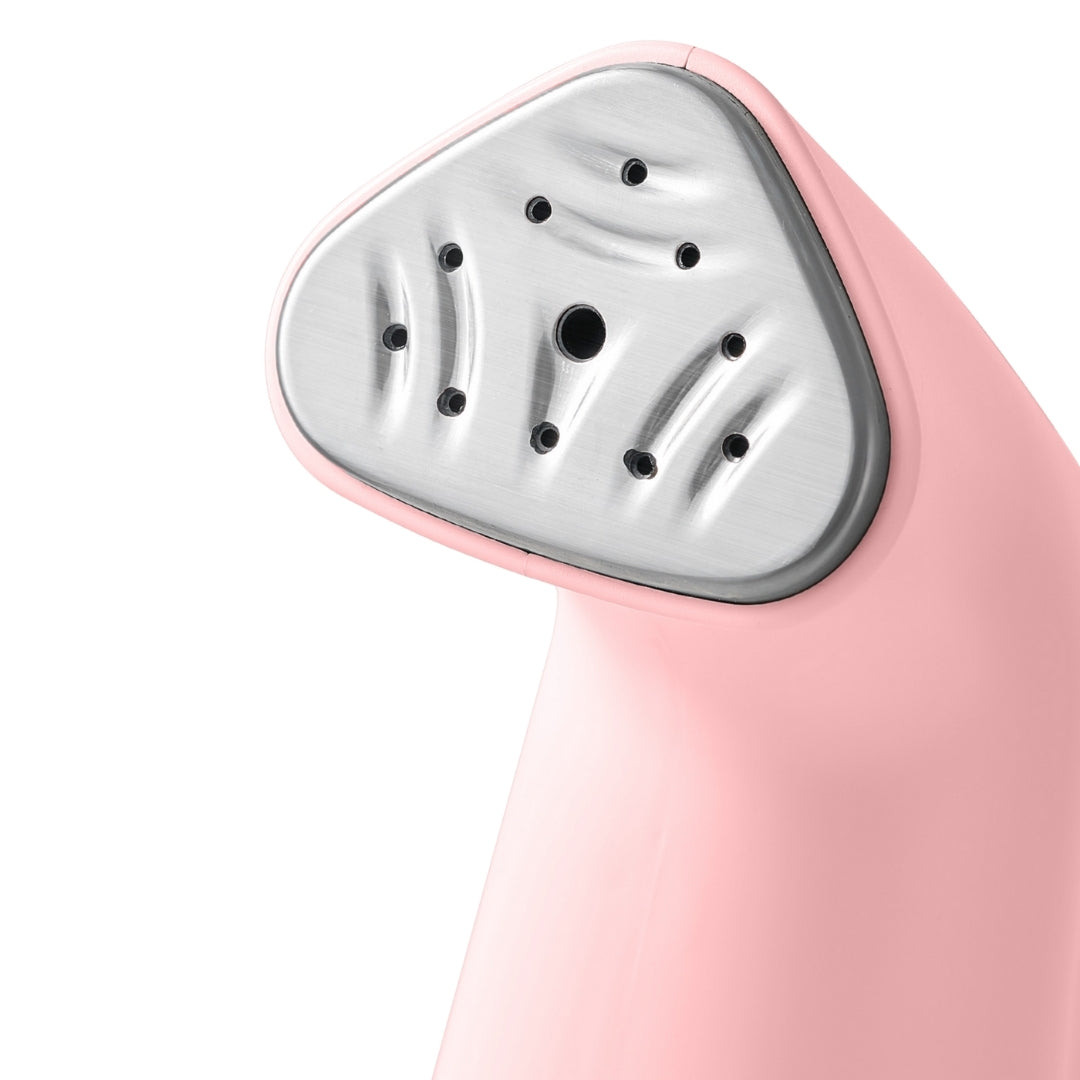 TS38 + Pink + Close-up of a pink handheld steamer with a metallic nozzle on a white background