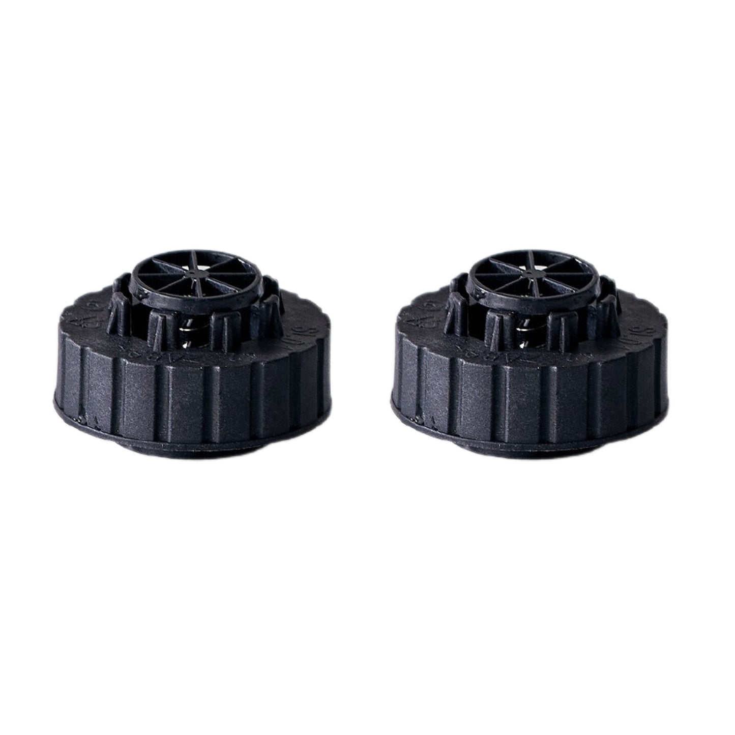 Two black plastic water tank caps on a white background