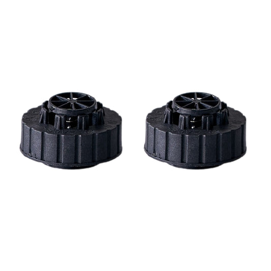 Two black plastic water tank caps on a white background